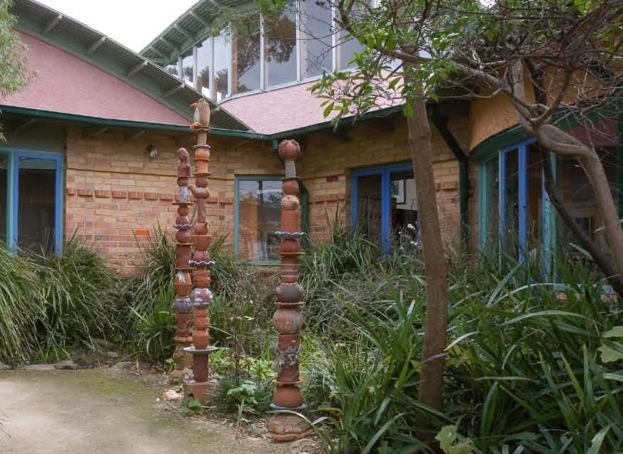 Ceramic Totem Poles in garden at BHCAC