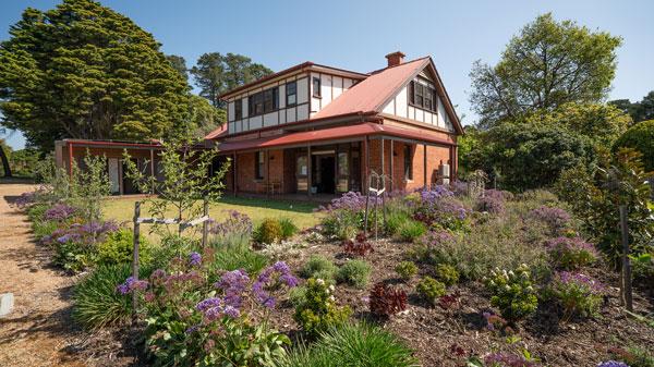 Strathdon House viewed from the rear including beautiful gardens