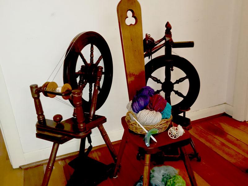 Photo of spinning wheels and yarn