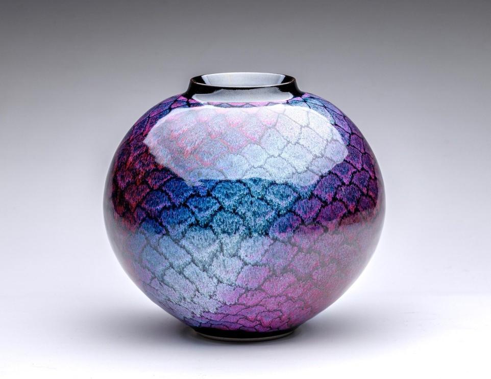 Purple and blue highly glazed ceramic vase with diamond pattern