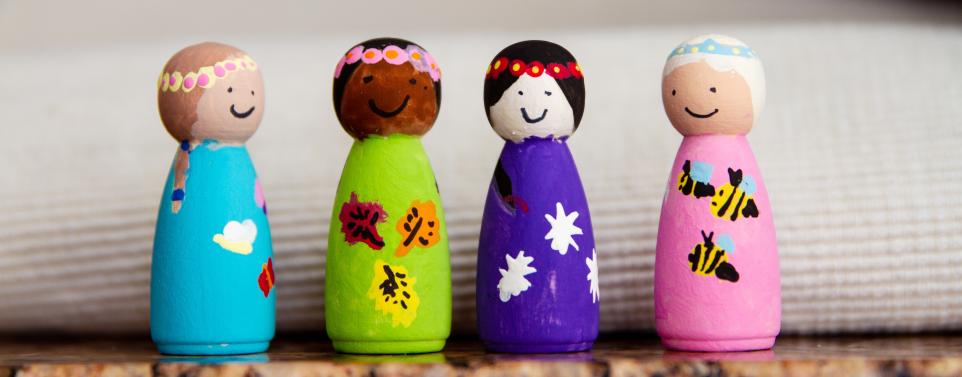 painted wooden peg people