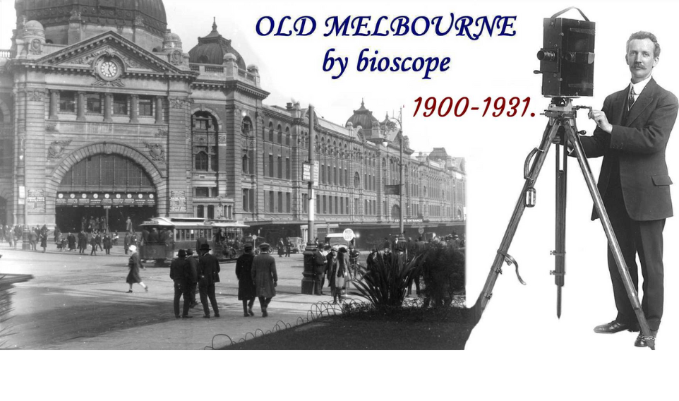 Black and white picture of Flinders Street Station and a photographer