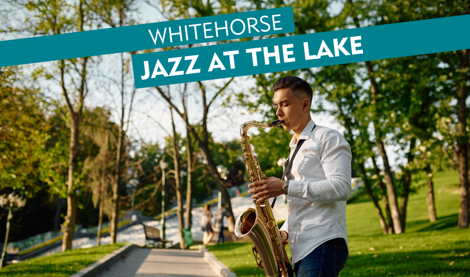 man in white shirt playing saxophone in a garden 