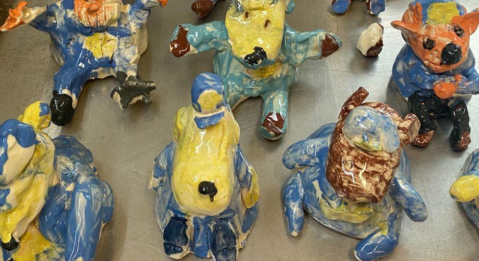 hand build ceramic dog man kids clay class