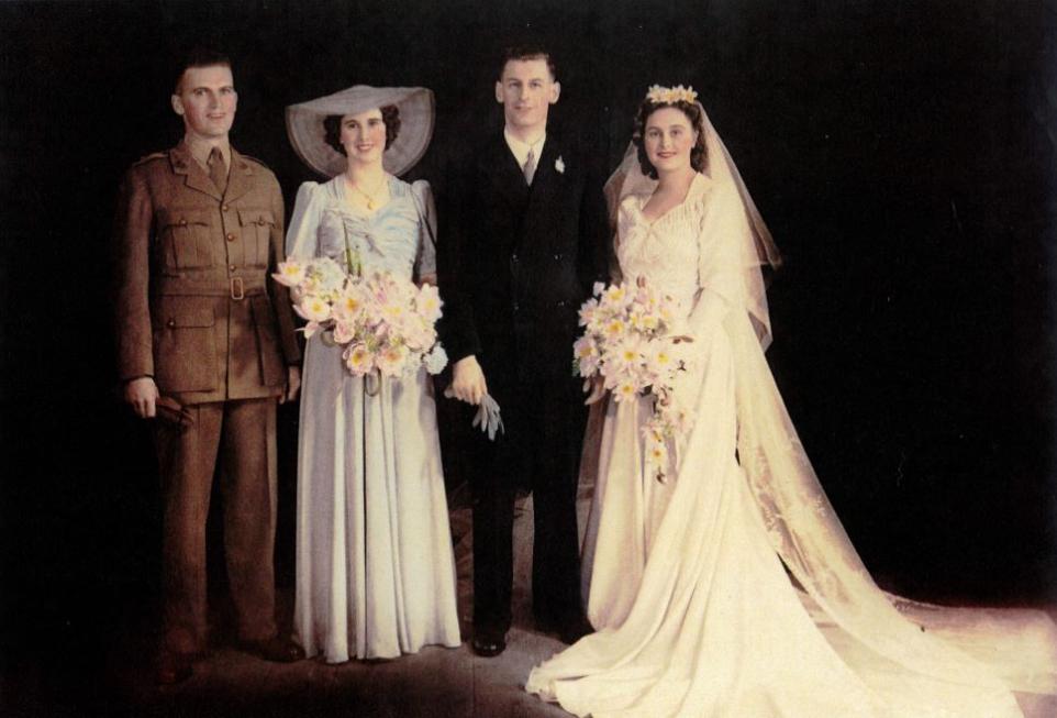 Photograph of a wedding party 1942, hand coloured.