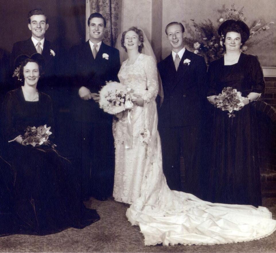Black and white photograph of a wedding party in 1950.