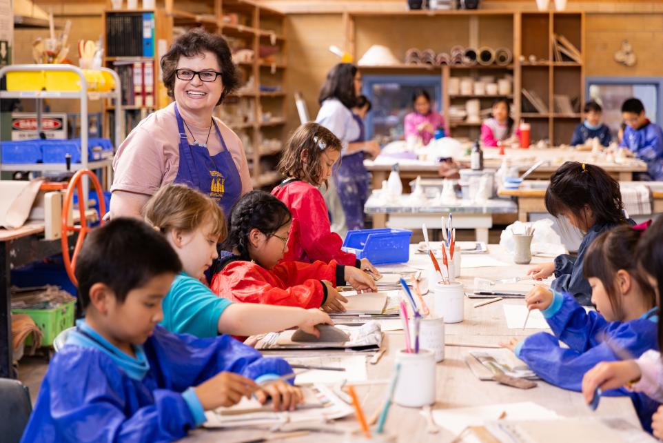 tutor and children in clay workshop BHCAC studio