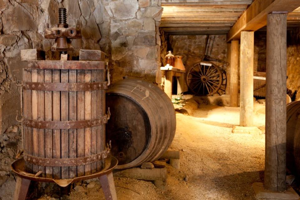 Underground cellar with wine barrel