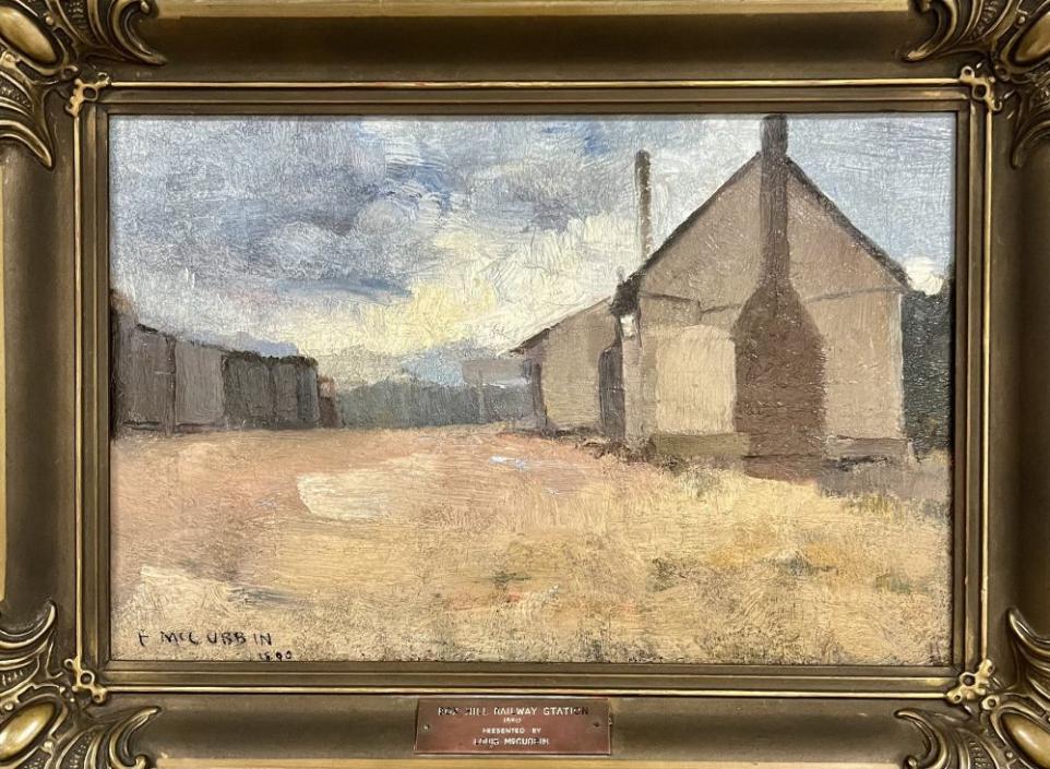 Impressionist painting depicting a rail shed in the landscape.