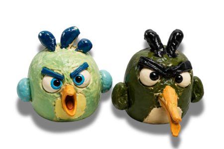 kids hand building in clay angry birds 