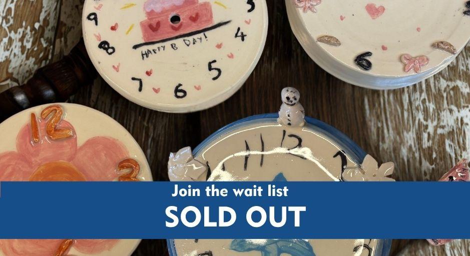 ceramic clocks with sold out overlay text
