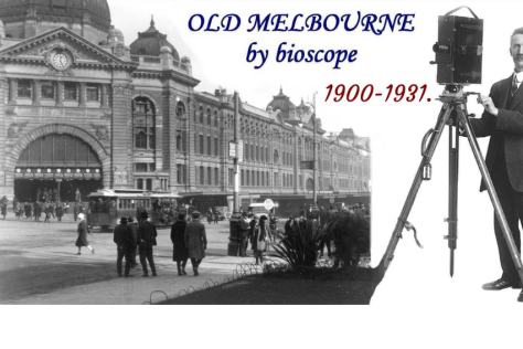 Black and white picture of Flinders Street Station and a photographer