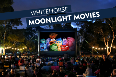 movie screen displaying animated Inside Out characters with text advertising the movie night 