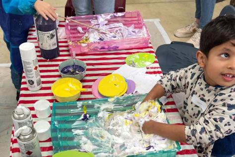 Child in messy art play workshop at Strathdon House 