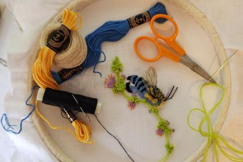 Embroidery hoop with threads and scissors 