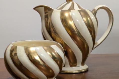 Gold and white striped teapot and sugar bowl