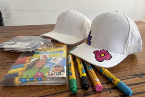 chilldren's art work on textile hats 