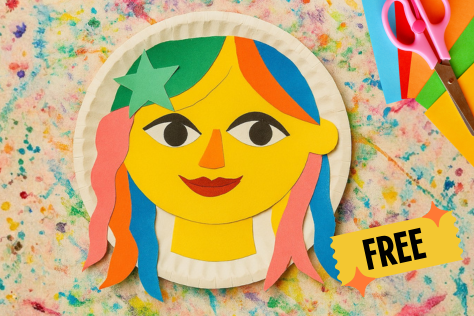 Colourful paper plate face craft with multicoloured hair and a green star, on a paint-splattered background, with scissors, coloured paper and a “FREE” label.