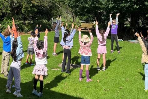 kids in gardens at Strathdon House taking part in a sports activity