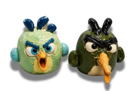 kids hand building in clay angry birds 