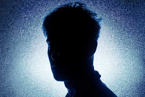 A person shown in silhouette
